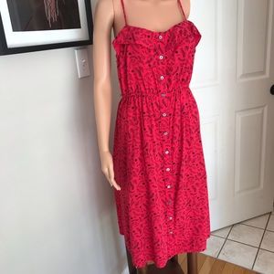 Knee length dress.